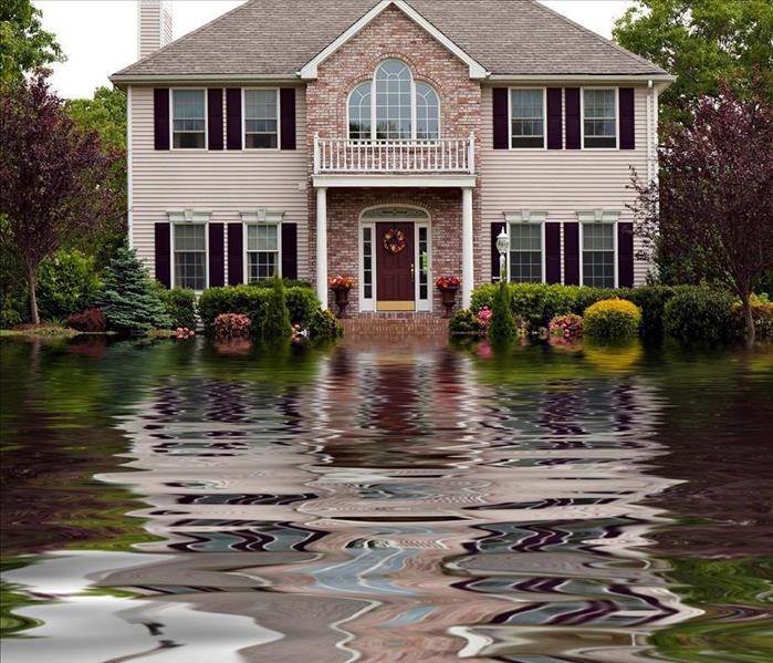 Image of the outside of the house flooded